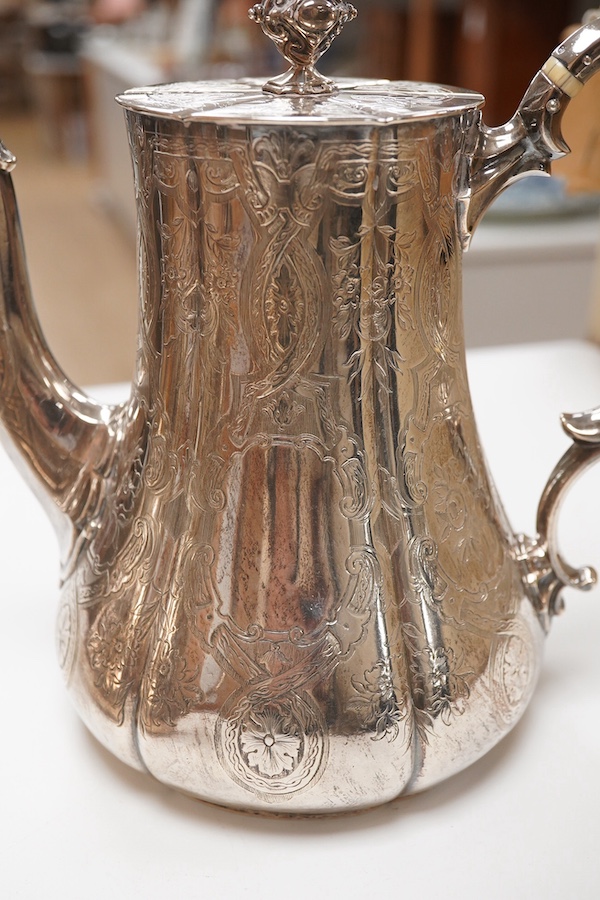 A Victorian engraved silver teapot and matching coffee pot, by George Ivory, London, 1857, gross weight 46.2oz. CITES Submission reference 4K2AZFRW. Condition - fair to good